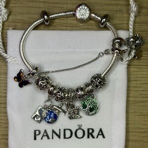 Original Pandora bracelet in set with assorted charms. Silver 925 Ale+bag.